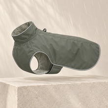RainShell lightweight dog coat in deep sage with fine reflective piping
